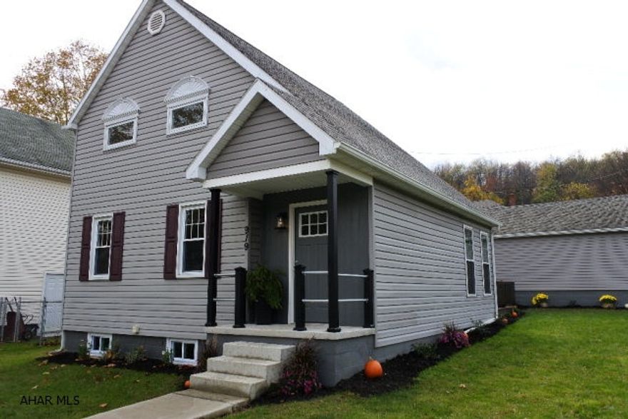 A new house feel!  Completely redone top to bottom with modern, unique fixtures and touches. Kitchen boasts an island made from galvanized metal and granite...SS appliances. Sunny breakfast room opens to a spacious deck. Custom Craftsman style storage unit in the foyer and crown moulding in the LR. Hardwood and tile throughout first floor...new carpet on 2nd. 1st floor bath with tile shower/glass doors and a laundry.  Master Bedroom gets a spacious feel from the vaulted ceiling and loft...plus lots of light. New 2nd floor Bath.  New furnace and C/A.  Flat lot and a big 2 car garage.  A great opportunity to get a quality home with the work already completed...just move right in! There is a bedroom and bath on the first floor...super convenient for guests. Realtor owned.