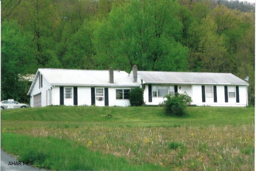 Rancher on large lot with nice views.