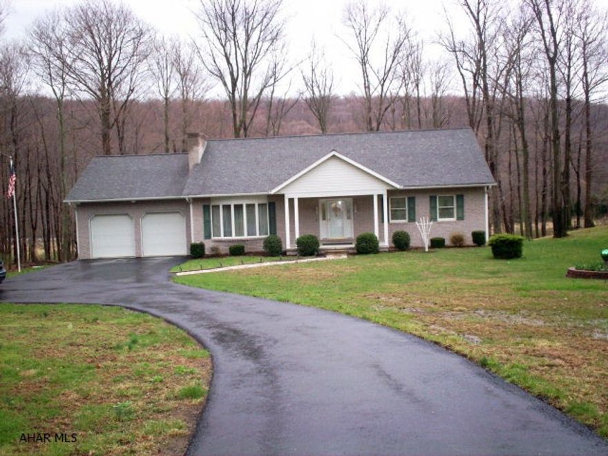 This exquisite 3 bedroom/2 bath home on 2.6 acres was built in 1994 by Bill Waltman. It is in immaculate condition in a beautiful and quiet setting along Cumberland Road (just minutes from downtown Bedford). The family room has a large gas fireplace which is perfect for those cold winter nights. The main floor is entirely carpeted throughout(excluding the kitchen) and is quite spacious. There is an in-house vacuum system for easy vacuuming throughout.  A stream borders this property to the left of the paved driveway. This is a beautiful home and a perfect setting for raising a family. If you appreciate quality craftmanship, you have to see what is located in the basement of this home.  It is one of a kind!! (Can be purchased seperately.)