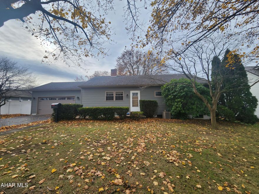 Welcome to East Julian Street in the borough of Martinsburg. This ranch home offers one-story living with first-floor laundry. The kitchen has been nicely updated with stainless steel appliances and a brand new dishwasher. The large living room offers a wood-burning fireplace and access to the backyard. Previously a third bedroom was converted to a large bathroom with a separate shower and tub, and an adjoining laundry room with sink. Down the hall are the two bedrooms with the primary bedroom having a cedar closet and access to the back yard. The basement is unfinished and great for storage. The fenced backyard is large and great for entertaining. Call listing agent for your tour today.