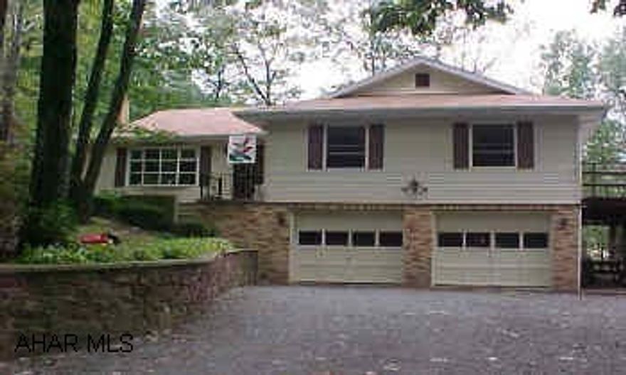 Nice raised rancher on private wooded lot new siding, new roof, deck stained move in condition.  Above ground pool with fence. From Krafti corner or Oak spring winery go 3 miles Riggles Gap Rd, turn L on Graham Drive.  3rd house on right.Electric hear also.  Heat is coal stoker.