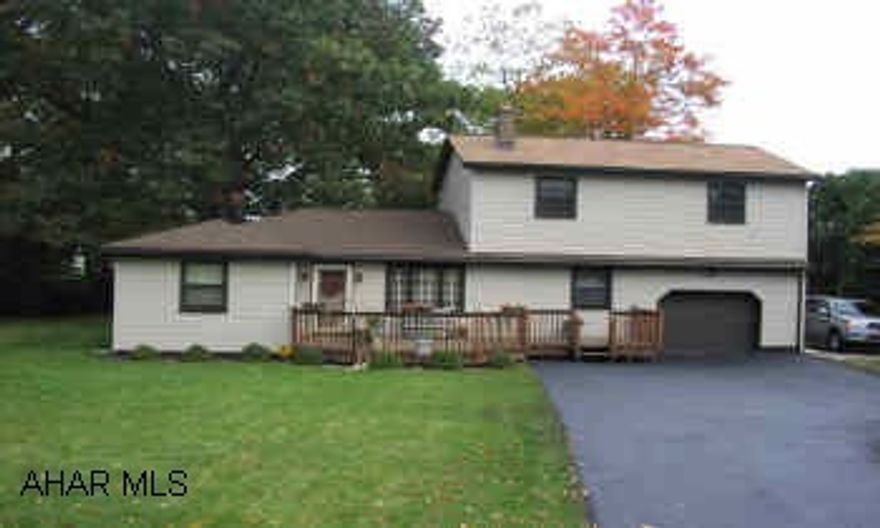 Immaculate 5BR home with oak trim throughout, updated kitchen with oak cabinets, w/w carpeting, beautiful stone firplace with gas logs, screened in back porch, fenced property and much more. Great area. New wiring, plumbing, windows, gas furnace with central air.