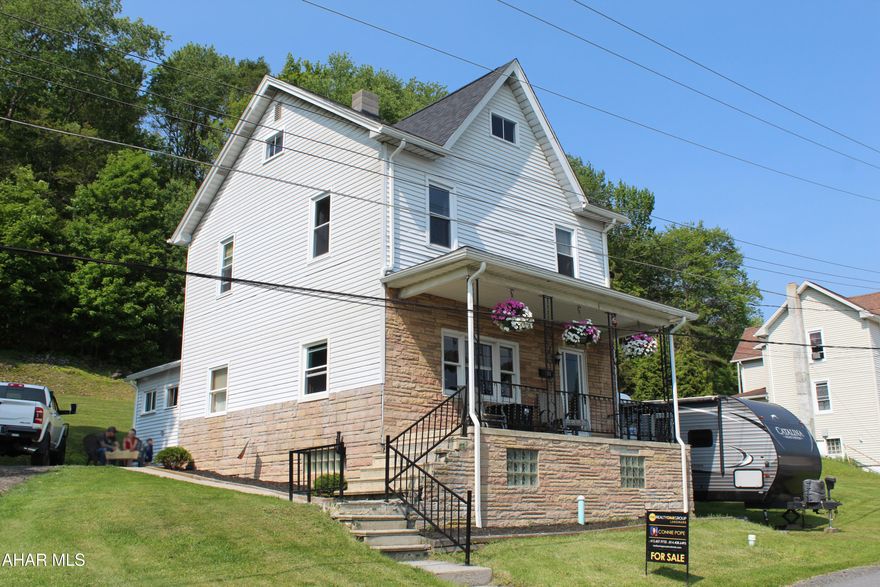 Welcome to this charming, well-maintained home, nestled in a small-town setting. 

Step inside and take your shoes off in the convenient (and cute) mudroom. Then enter the large kitchen with classic cabinets. Next you'll see the beautiful oak hardwood floor in the dining room. The open living room gives a nice place to relax. 

Upstairs are 3 carpeted bedrooms and a full bathroom. Walk-up access to the attic with lots of storage space.

Outside, the spacious yard offers plenty of room for kids and/or pets, gardening, outdoor gatherings, or simply relaxing in your own private green space. The off-street parking ensures easy access, and a 50 amp electric box on the side of the house that can be used for a generator.

And with a brand new roof, you'll have peace of mind for years to come.

Don't miss this opportunity—schedule your private showing today!