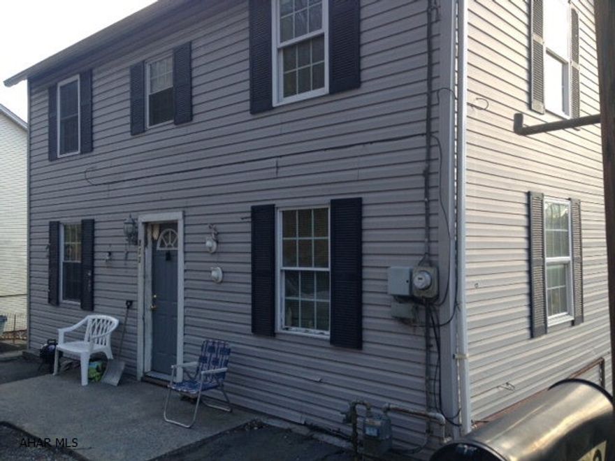 Two story home within minutes of Downtown Bedford. Great rental investment with long term tenants. 222 Sunnyside Rd and 218 Sunnyside Rd can be purchased together. Being sold AS-IS.