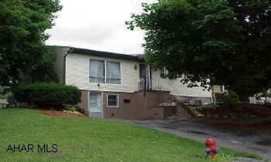 Nice Raised Ranch in good condition, freshly painted, and in move-in condition.  Large Rec Room which includes a wet bar, large fish tank, regular slate pool table, and a gas fireplace.  Pretty landscaped  fenced lot with an 8x10 shed.  Workshop in the basement and a large covered deck.  Possesion after 9/15/04.