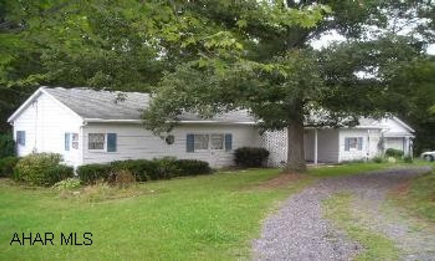 Lovely yard and loads of room. Some newer carpeting and paint, water conditioning system to be installed 9/2006, security system, central air, livingroom, and family room, eat-in kitchen plus a dining room. Nice curb appeal, good views, shaded yard!  Plenty of room here - enjoy three bedrooms(one being used for an office), 2 full baths, large family room, dining room and an eat-in kitchen, large livingroom.  Central air, nwr water conditioning system, several porches (one screened in), attached 2 car garage, partial basement.  Good location and Chestnut Ridge Schools!