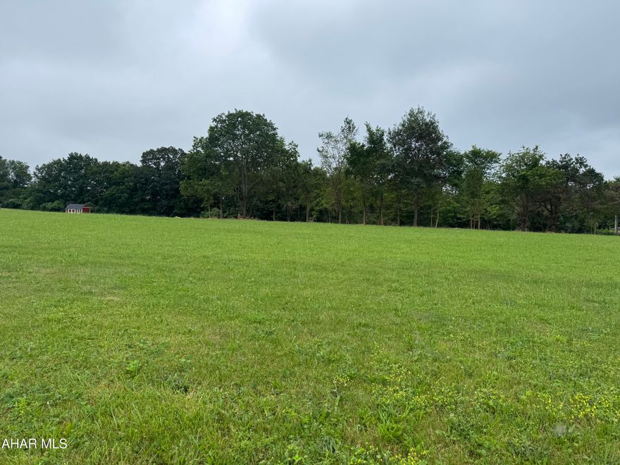 Beautiful building site near Prince Gallitzin State Park. Mostly level and good frontage this site is 2.5 acres and is ready to go!  Public water and sewer is across the highway and is available - saves approx 20,000 on well and on lot sewage. Very nice country location about 30 minutes from Altoona.