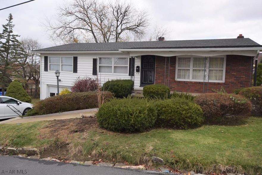 Nice ranch home close to Orchard Plaza and the Logan Valley Mall.  3 BR, 2 BA.  Newly refinished hardwood floors.  Open floor plan in kitchen and dining room.  Family room with fireplace in basement.  One car integral garage.  Deck and gazebo.   Check out this comfortable home before it's gone!