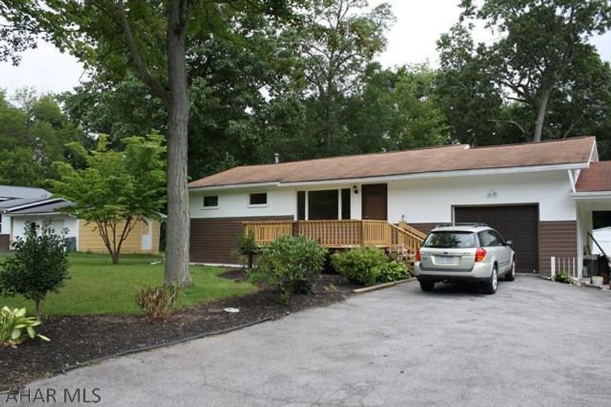 Recently renovated home with lots of extras. Nicely remodeled kitchen and bath with Jacuzzi tub. Hardwood floors refinished, new tile in the kitchen. Newly refinished deck. New central air conditioning installed.