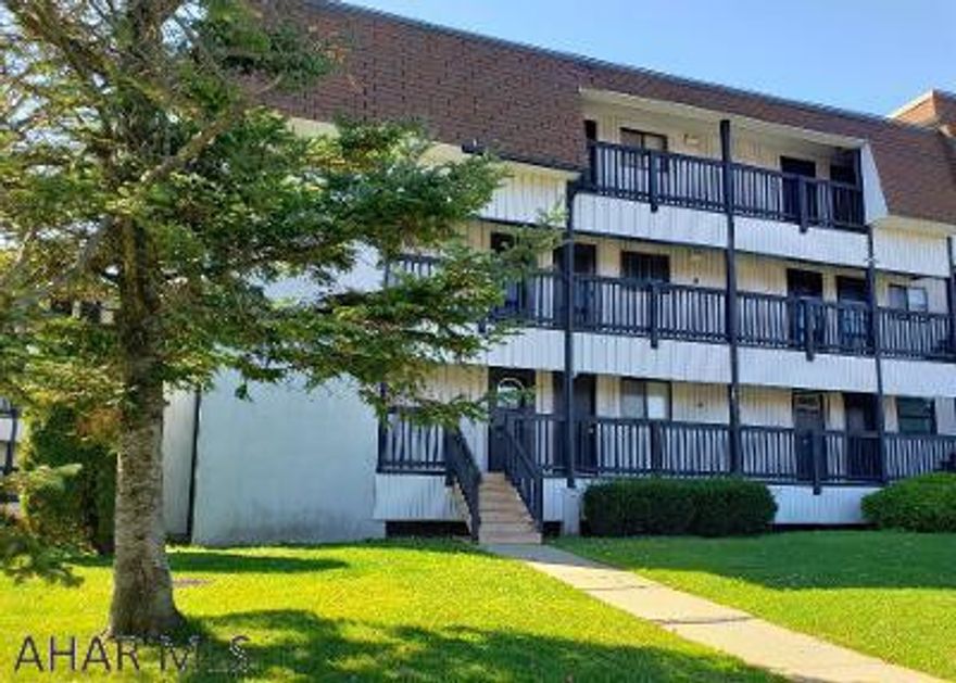 Lots of upgrades: Stone fireplace, ceramic tile in baths & newer washer & dryer! 1st floor 2-bedroom 2-bath condo. Move-in ready! Enjoy the amenities of this 4 season resort!  $256.00 monthly association fee includes outside maintenance, road maintenance, tennis, hot tub, outdoor pool & trash removal (Skiing & Golf for a fee)  Sq ft per tax card - buyer to verify sq ft & taxes. J-522