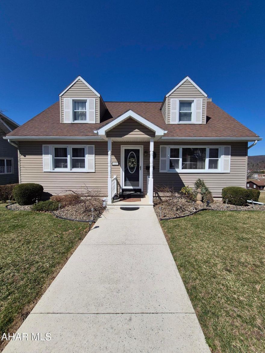 Situated on a corner lot on the outskirts of Altoona, this Cape Cod-style house is waiting for YOU to call it HOME! Step inside the front door where you will find stunning hardwood floors in the living room and modern quartz countertops in the kitchen, adding elegance and functionality to the heart of the home. The first floor also includes 2 spacious bedrooms and a full bathroom, providing convenience and comfort for yourself and guests alike. Upstairs, you'll find 2 additional bedrooms and another full bathroom, offering ample space. The home features central air throughout, ensuring year-round comfort.
Additionally, the basement is partially finished and includes a convenient half bathroom; it could be easily finished to add even more living space. This lower level offers endless possibilities for customization, whether you envision a cozy living room, a home gym, or an entertainment area.
Outside, the property features a well-maintained lawn and landscaping that enhance its curb appeal. A deck provides ample space for relaxing in the sun, while an additional screened patio below offers a shaded retreat. Imagine hosting summer barbecues or simply unwinding with a good book in these inviting outdoor spaces.
The home is conveniently located close to all amenities, including Penn State Altoona, making it an ideal choice for those seeking both comfort and convenience. 
With numerous amenities available both indoors and outdoors, this property is sure to impress. This house offers the perfect blend of style, comfort, and convenience. Schedule your tour today to experience it firsthand.
