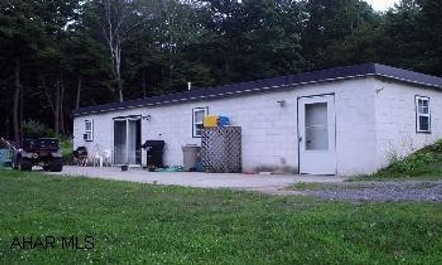 2 BR foundation (block) eat in kitchen, family, gun room excellent starter, can build on. 5.4 acres. Call Don Sheridan