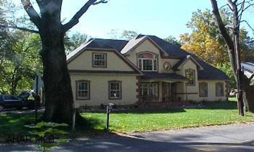 Beautiful 2-Story-Attention to Details-Pella Windows, Tile,Carpet & Hardwood floors- Granite Counters-Corian Bath Well Built-with Radiant Heat in floors-Central Air-Beautifully Appointed- Must see to appreciate-Master Bath-Corian Top-Dressing Table- 6 Panel Oak Doors throughout-Oak Trim-Attic-Pull Down-Stainless Appliances Finished Crawl Space-Concreted
