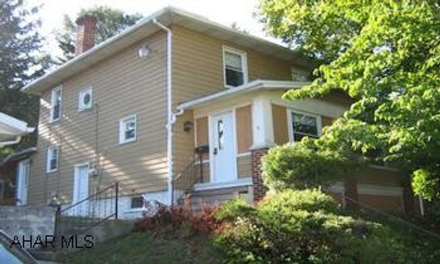 Mechanically sound house in nice, quiet neighborhood.  Convenient to everything!  Needs a little TLC but worth the effort.  Great space, cute sunporch. First floor half bath.   Semi-finished basement with half bath.  Very nice newer two car detached garage with openers.