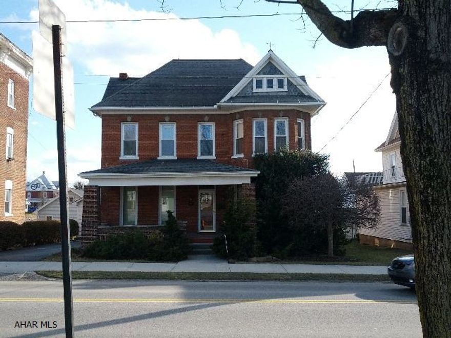 Beautiful Brick with natural woodwork, formal dining room, first floor bedroom, bath and laundry, 1 car-garage, deck & nicely landscaped back yard.   #J-182