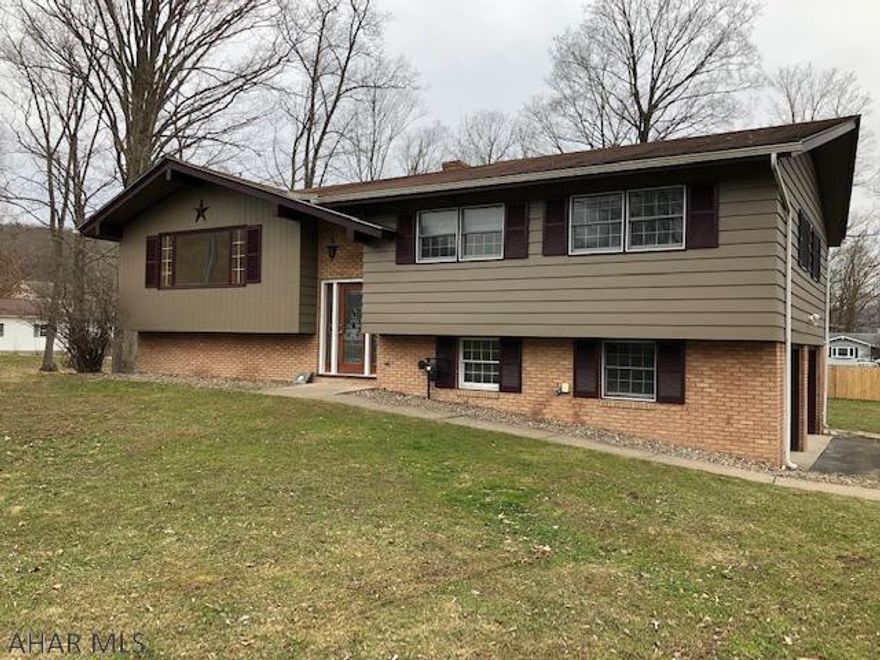 3 bedroom , 2.5 bath home in Bellwood Antis School District. Fabulous entertaining space with large rec. room w/ gas fire place and 1/2 bath. Walk out onto a large paver patio with custom firepit, sitting bench and counter area.