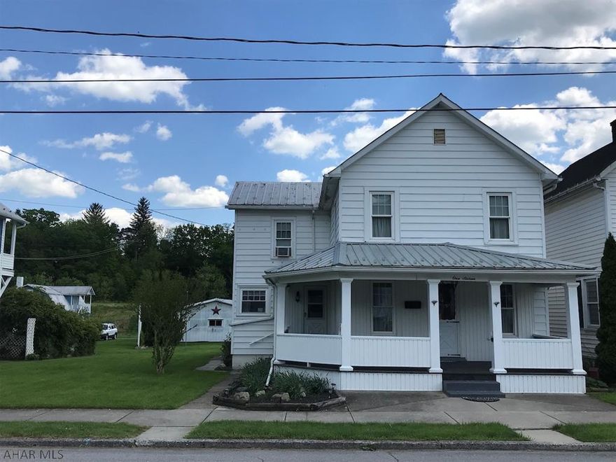 Immaculately kept home on quiet family friendly street in Everett borough. Double lot is flat and has a 2 car garage with workshop in back. Home has 3 beds with 1 bath, a convenient first floor laundry room and two living areas. Attic is spacious and could be finished into more living space or bedrooms. Newer windows and forced air oil heat with central air. This meticulously maintained home has all the amenities and conveniences in a great location. Schedule your private showing today!