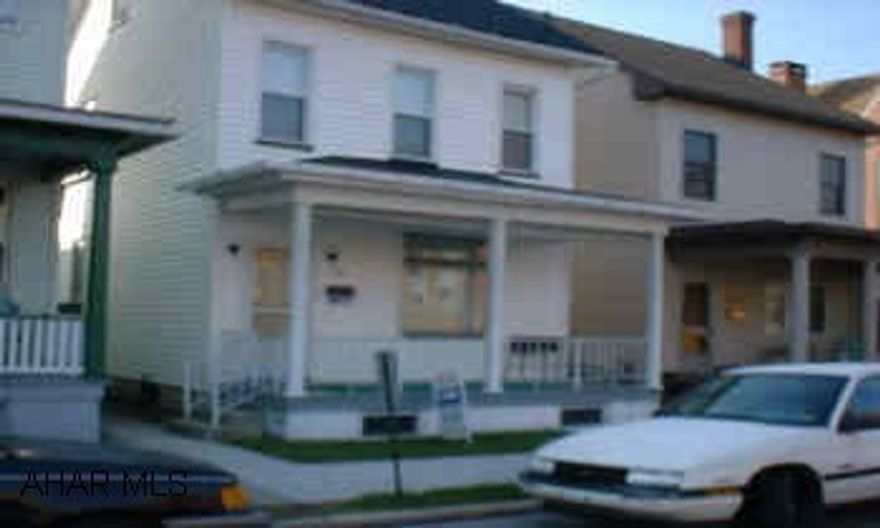 2.5 STORY HOME WITH GARAGE.