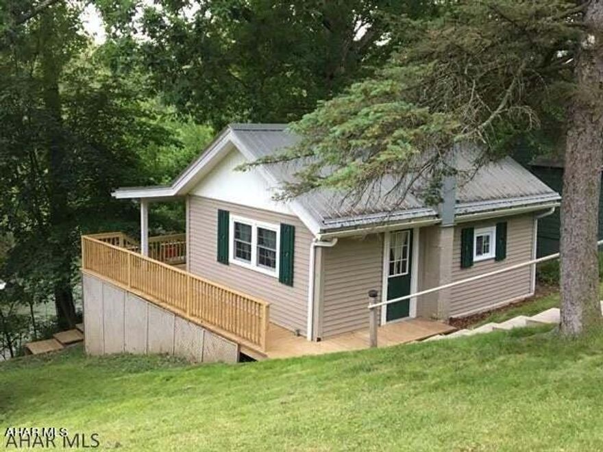 Beautiful tranquil setting along the Juniata River! Updated 1-bedroom 1-bath vinyl-sided cottage with covered back porch & nice deck overlooking the water. Great place to get away or live there full time.