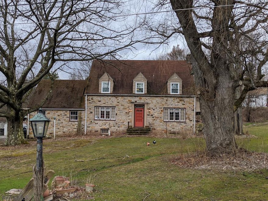 You've driven by this house hundreds of times and admired its look and location. Stone 4 bedroom house on nearly 3 3/4 acres. This is an exceptionally well built home in need of TLC. Hardwood floors and a large wood fireplace in a oversized sunken living room. Newer boiler. Covered patio and an inground pool with pool house. Pool needs a liner at a minimum and likely other maintenance. Due to the condition, this property is not likely to qualify for FHA/VA/USDA financing.