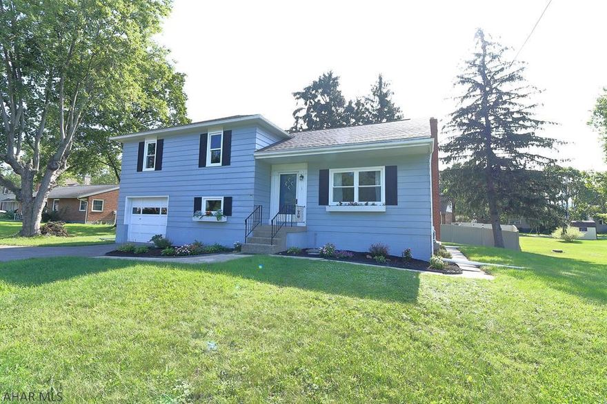 Absolutely delightful split level home now available at 412 Bel Air Rd, in the Hollidaysburg borough. Main level includes large living room with hardwood floors along with an updated eat-in kitchen. Hardwood floors extend through all of the bedrooms. New roof, combined with updated air conditioning and electrical system make this home positively move-in ready. Ask to see this home today!