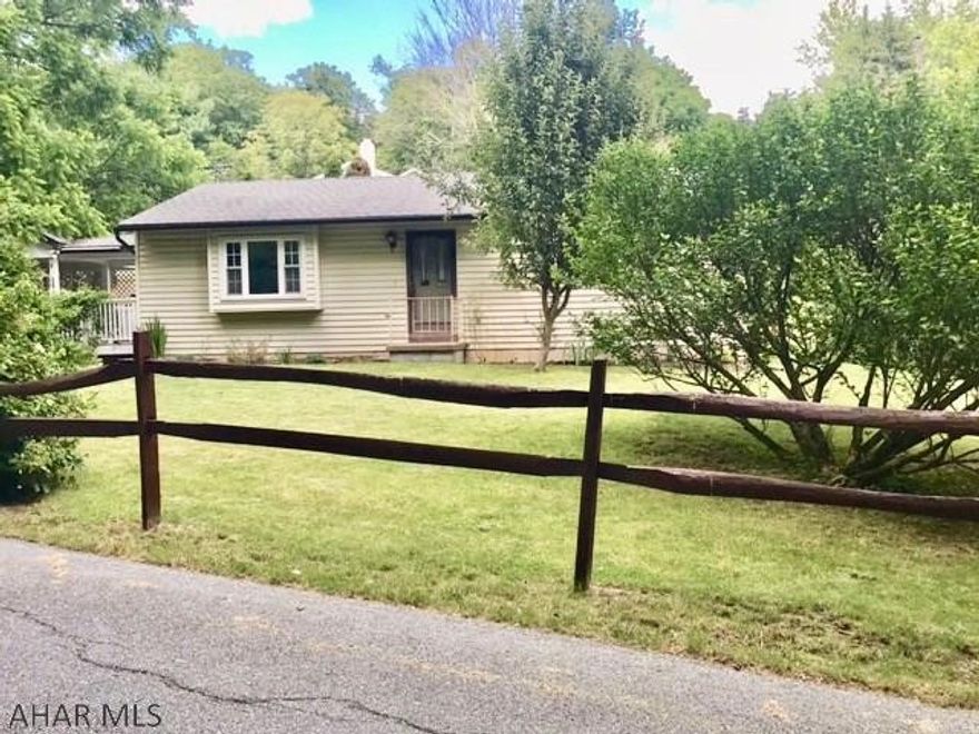 Well Maintained 2 Bedroom Ranch located in Quiet Wooded neighborhood. This home is situated on a corner lot facing woods with hiking trails. This home features new Kitchen Cabinets and Countertops.  Would make a great Starter home or an Empty Nesters Dream. Enjoy your coffee on the covered deck right off of the kitchen.