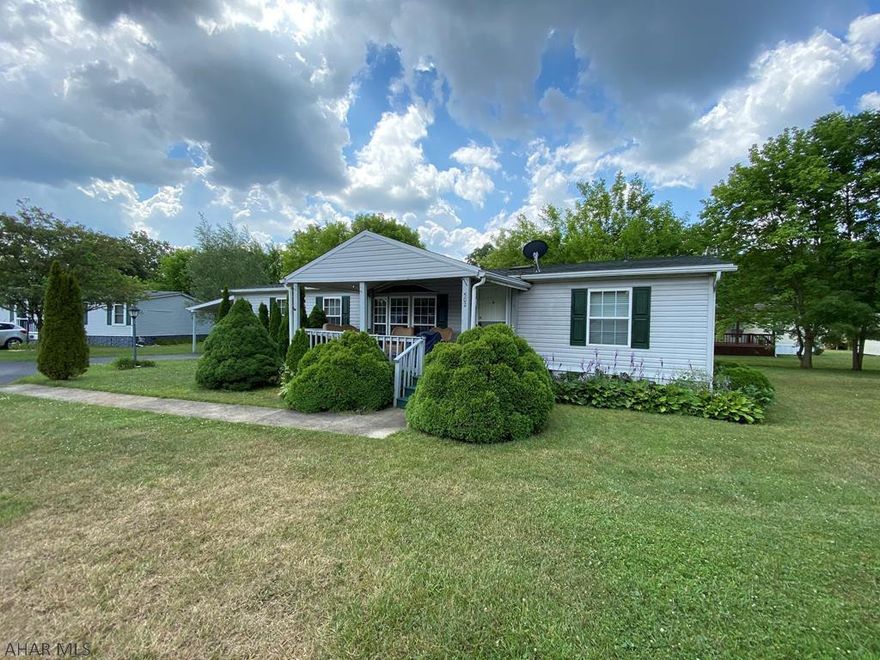 Lovely 3 BR 2 BA doublewide in 55+ independence Ct. Situated by a little stream and surrounded by trees sits this spacious and well kept home. It boasts a large open floor plan, with a kitchen filled with cabinets and counter space. Master has it's own bathroom with soaking tub and WIC. 2 other bedrooms are nicely sized and there is also a 2nd full bath. Extra room for an office or den with French doors, dining room with sliding doors to your very private deck, and laundry area too! Lot rent includes trash and snow removal. 3 yr old roof, 2 yr old HW tank.