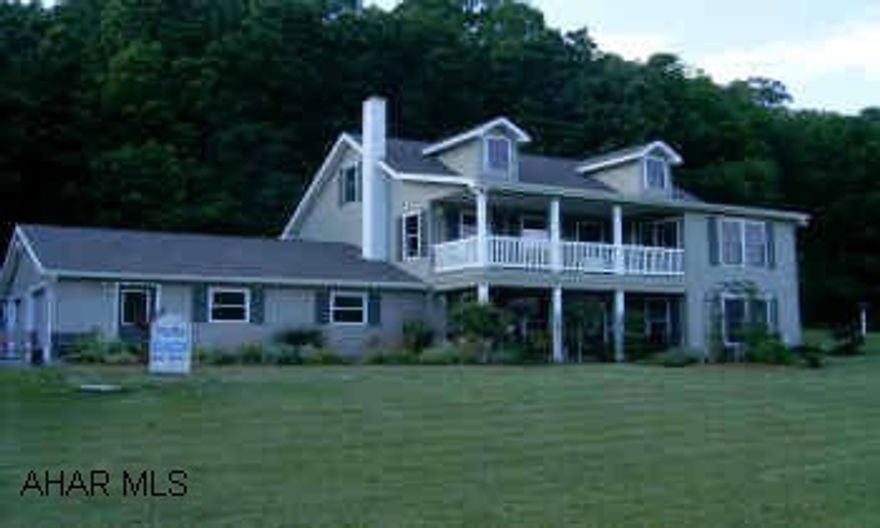 Immaculate home of superior quality-swirled ceilings with Hunter ceiling fans, walk in pantry, oversized 28x30 garage w/workbench. Maintenance free decking, herb garden and many perennials. Flue for woodburner could be used from garage or family room. Enjoy wildlife and beautiful views from this private location on 4.53 acres. Only 20 minutes to Altoona or 25 minutes to St. College. Immaculate home of superior quality. Unfinished 35x15 third floor could be finished as you like - perfect for master suite or 2 bedrooms. Lower level has handicap accessible bath - could be great in-law suite.