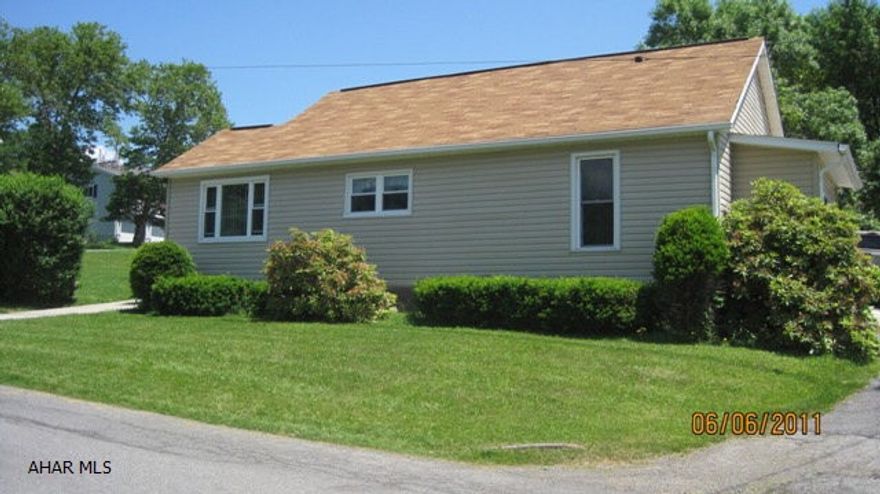 Updated one story.  Move in condition with detached over-sized 2 Car Garage and extra parking for 4 Cars.