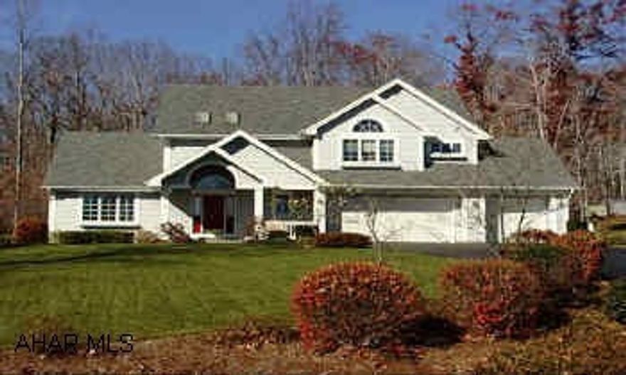 Just beautiful!! Many amenities, integrated smoke alarm sys. security sys. & moisture detection sys-reverse osmosis water sys. central vac. custom drape/window cov. new furnace air hotwater tank well pump exterior lighting baldwin brass new front door hdwe.