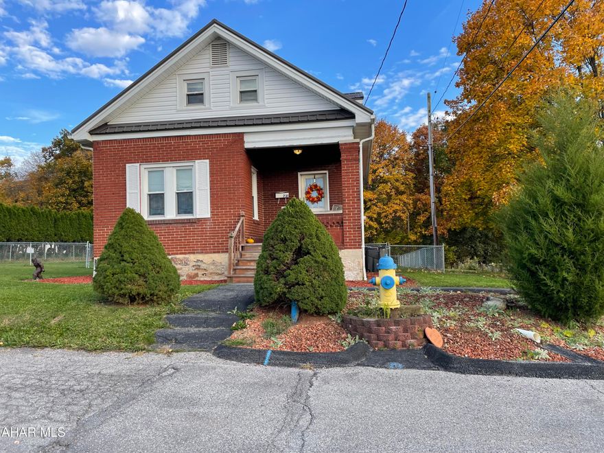 !!! Motivated seller, all offers will be considered!!!! Adorable 1-1/2 story Cape cod home on a large, beautiful lot with a fenced yard and a new above ground pool. 1/2 basketball court in back yard too!! On street parking but definitely enough space to put a garage! Perfect quiet location with and an amazing view of the city. Lots of room to expand. New roof with warranty. Updated bathroom and windows. Kitchen needs some love but tons of potential.