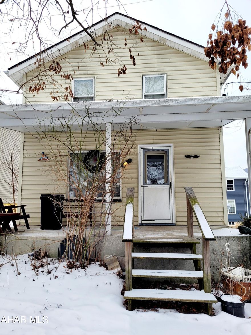 3 bed, 1 bath home with plenty of potential on a corner lot in Roaring Spring! There is a nice front porch, and a back deck. The yard offers the opportunity for off street parking. The downstairs features a living room, dining room, and kitchen, with a full bath and a small room off of the dining room/kitchen that could make a great pantry or other storage opportunity. The kitchen features a pass through which is a great place to set up a breakfast bar. Upstairs you will find 3 bedrooms, as well as a back bonus room that could either become large closets for two of the bedrooms, storage, or whatever your imagination decides! The home needs some TLC with cosmetics, but had recent electrical/hvac/plumbing work done. It has the potential to be a gem, so stop by today!