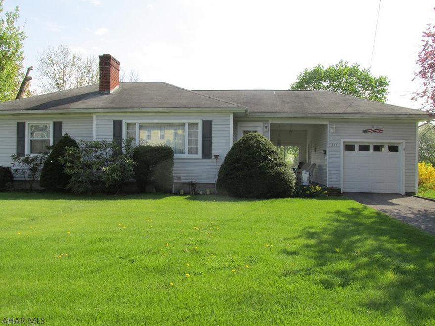 Lovely 1 story Family home, LR, DR, Kitchen, MBR, Full BA, BR, BR, Large Deck, Breezeway and 1 Car Garage.  1.24 AC lot to rear of home, many possibilities.  Home was built by Greenleaf Builders.  Hardwood floors under carpet, vinyl sided, new windows.  All appliances stay with the property.  Basement has a shower, and Laundry Hookup, workshop, and bonus rec room, and walk out.  Priced to sell!  1 Car garage is 10'10" X 19'7"