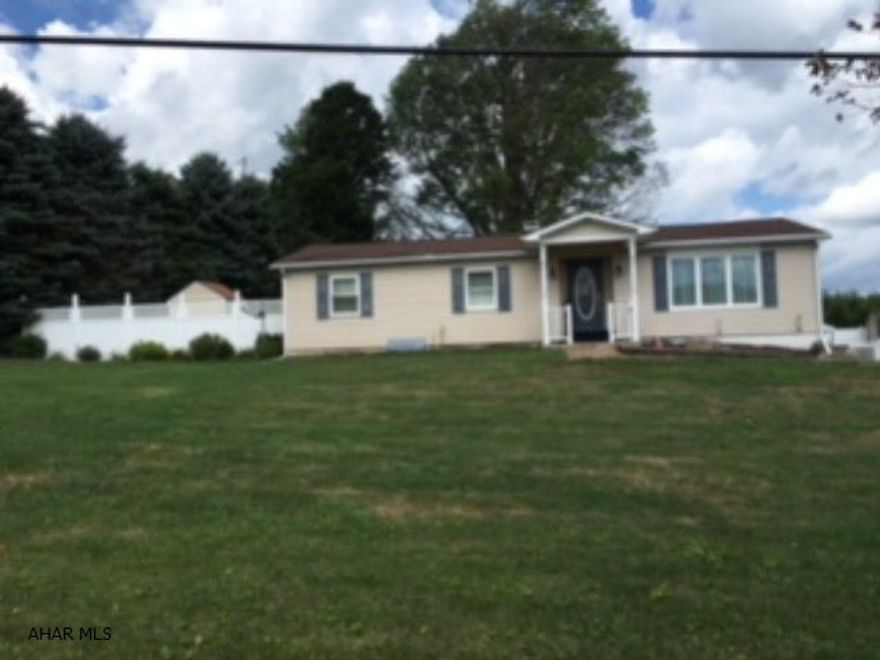 One of a kind 3 bedrooms, new kitchen beautiful four season room with stamped concrete flooring, 2 sheds, covered patio, completely updated