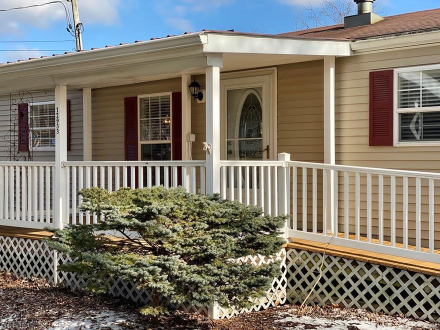 Here is your opportunity to enjoy affordable lake life, whether for a vacation getaway or year round home.   Beautiful 3 BR, 2 BA, meticulously maintained single wide with upgraded package, brand new kitchen and bathroom counter tops, situated on a 1 acre rented lot, with ample parking for a boat and includes a storage shed to store all your toys.  Just minutes from the Raystown Lake Seven Points Recreation area.  Owner Suite includes large 3/4 bath with two walk-in closets.  Open concept living, dining, kitchen for entertaining and relaxing after a day at the lake and central air to cool off.  Enjoy your morning coffee on the covered front trex deck, which also features a ramp.  Call today, and you can be settled in before spring.