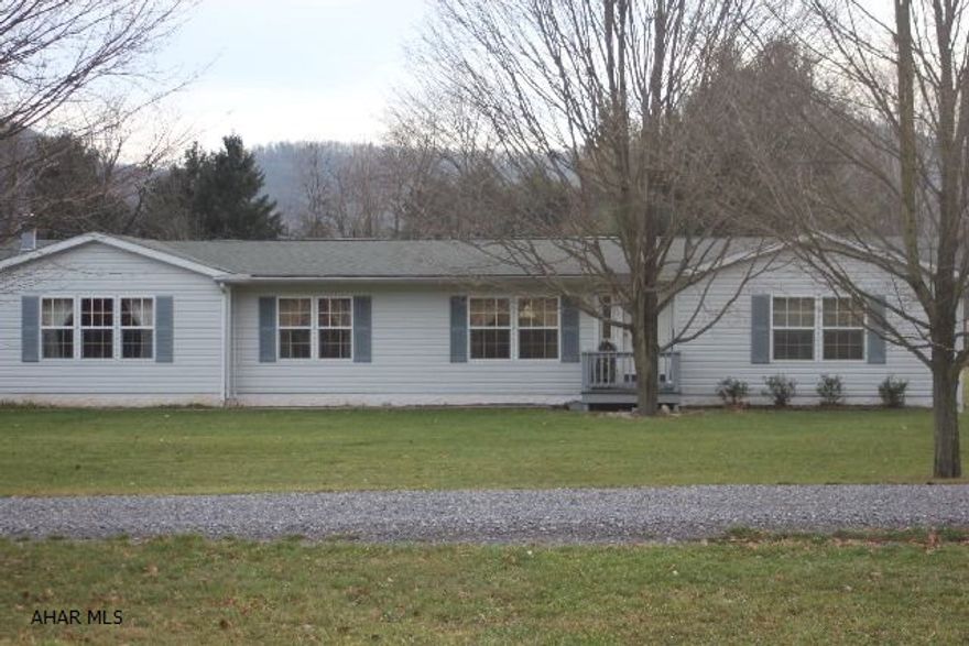 Wonderful 1.45 acre of manicured ground with a extra large manufactured home with 3 bedrooms, 2.5 baths. Inpeccable condition. 1 owner built in 1997-98 on permanent foundation, large 2 car garage on a poured block foundation. The curb appeal is to die for. Call Today!