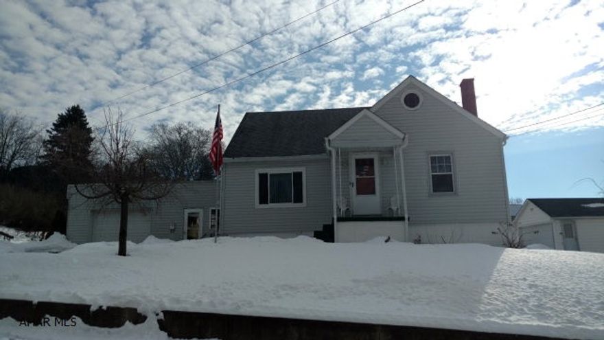 MOVE IN READY 3bedroom 2bath home with partially finished basement in Spring Cove School District! This home features original hardwood flooring, updated plumbing, new furnace, updated windows, siding and gutters, and a newer hot water heater! Enjoy the sitting area in breezeway leading to the attached 1 car garage. This home has a great location within walking distance to the Spring Dam, YMCA, baseball fields and the football field. Call listing agent for your showing today! Property address qualifies for USDA financing.