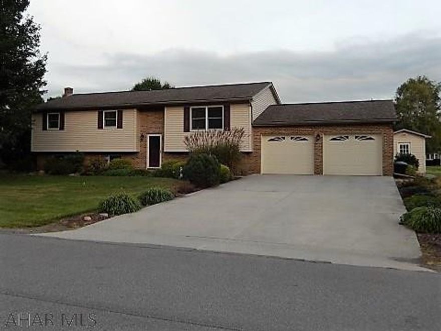 Highly sought after Tipton area.  Over sized 3-5 bedroom home offering 2.75 baths and 2 full kitchens.  Enjoy spacious rooms including a newer sun room addition that leads to a very nice patio area.  Formal dining room, large Master bedroom suite featuring updated bath with step in shower.  Lower level family room is perfect for entertaining with the full kitchen and 3/4 bath.  Large 2 car garage and just step outside to enjoy the 4th of July fireworks!