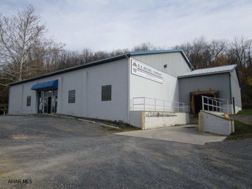 One-story masonry & frame building containing 7,240 S.F. Ceiling heights range from 12' to 15' , one 10' overhead drive through door and one loading dock. Newer 200-amp electric, natural gas, public water & public sewer. Entire building can be heated, 5 natural gas furnaces and a portion of the building has central air. Building is well maintained & nicely updated. Great for warehousing, retail business, office space buildout or vehicle storage. Located in Bedford township with no zoning. Lease option available. Owner financing.