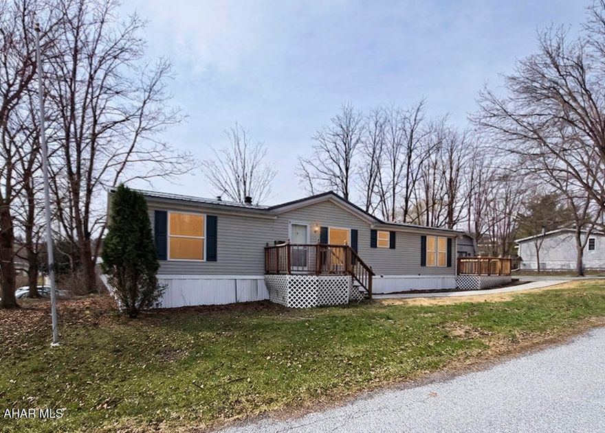 Beautifully updated 1996 Champion 24x52 manufactured home offering stylish, move-in-ready living with extensive renovations already completed. Major improvements include all-new insulation, new subflooring throughout, updated water lines with full plumbing improvements, and a new forced-air electric HVAC system with a high-efficiency heat pump for year-round comfort and energy efficiency. Inside, the home features fresh modern finishes, updated flooring throughout, a bright and spacious open living area, and a beautifully remodeled kitchen with updated cabinetry, countertops, backsplash, and a center island for added workspace and storage. Both bathrooms have been thoughtfully renovated with updated vanities, fixtures, plumbing, and attractive tile finishes, including a spacious primary bath with double vanity and oversized walk-in shower. Additional highlights include recessed lighting, large windows for great natural light, comfortable carpeted bedrooms, and inviting outdoor deck space perfect for relaxing or entertaining. A wonderful opportunity to own a thoroughly improved home with both major mechanical updates and tasteful cosmetic upgrades already in place.