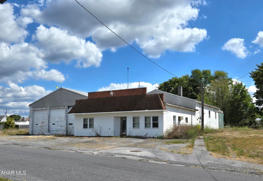 5,744 sq ft storage building with surfaced parking in North Woodbury Twp on .75 Acre lot. Current owner had used building for general storage. J-673