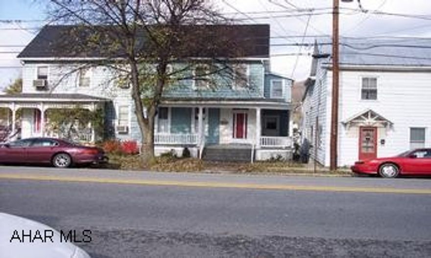 Historic home 4 bedroom 1 1/2 bath, 1 car detached garage, eat in kitchen, large newer deck, new furnace and several bonus rooms. Being sold as is.