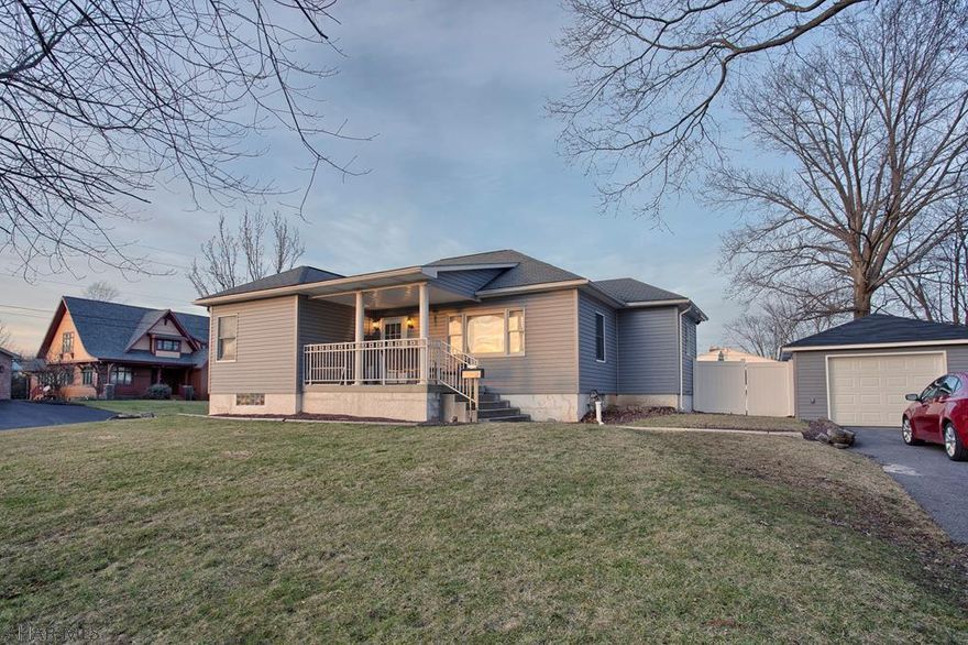 This beautiful move-in ready home in Hollidaysburg Borough would be perfect for a first time home-buyer or someone looking to downsize.  With 3 bedrooms (possibly 4) and 2 baths, this home sits on a large .26 Acre Corner lot with a PVC Privacy fence completely surrounding the private back yard, and has so much to offer.  Enjoy the Fire pit in the evenings with a beverage from the Concession Stand style Bar in the one car garage or family move nights in the basement on the projector screen!!! If you're looking for a well maintained home with newer mechanics, this is it!