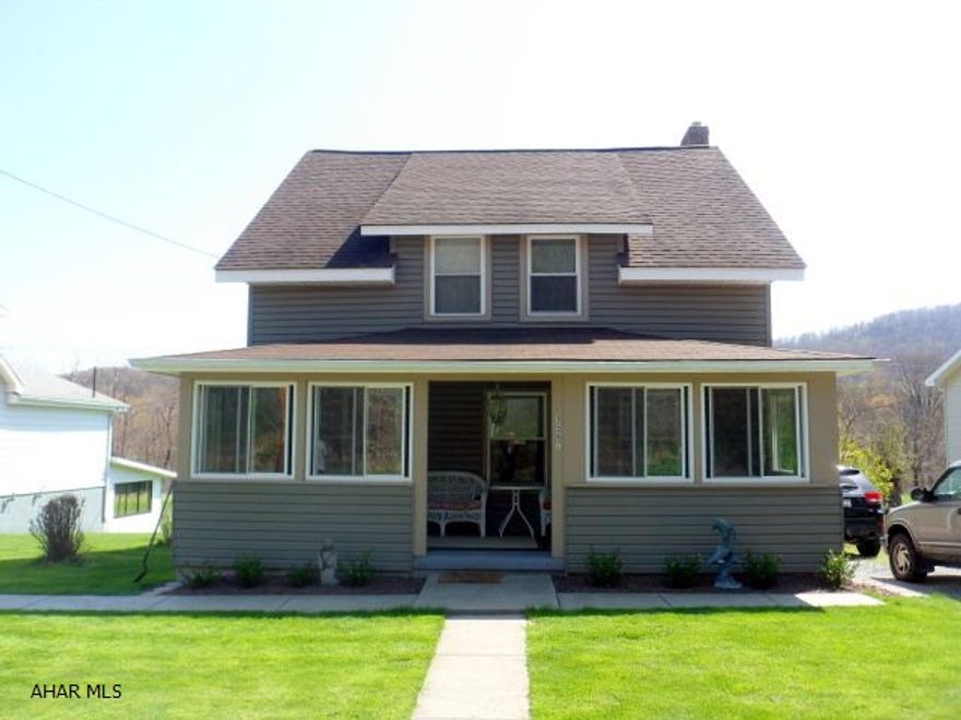 Enjoy nature at your doorstep - Logan Twp. - 3 BR, 2 BA, LR, DR, Eat-in-kitchen with appliances, closed-in rear porch, attic storage, basement laundry inc. Washer & Dryer, bath, walk-out to Hot Tub, 2 car garage, private drive, and large lot 56.46 x 612. Lot goes approx. 200 feet into woods. Many updates include: windows, siding, roof, floor coverings and whole house water filter...$124,900.