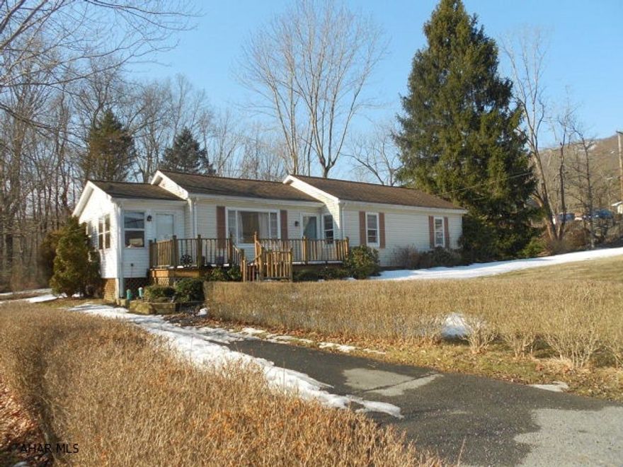 Starter home or retirement home. Three bedrooms, 1 full bath with both front and rear decks and a large yard complimented by fruit trees and a grape arbor. It just needs your loving touch to make it 'your home'. A full unfinished basement with 220 amp located in the Northern Bedford School District.