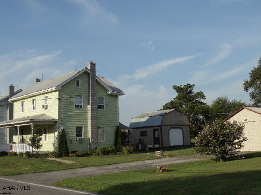 Move-in Condition!  Spring Cove Schools.  2-story home with vinyl siding, 2 modern baths, formal dining room, 2nd-floor laundry, woodburner, electric baseboard heat + coal furnace, 1-car garage/workshop + shed.  #J-008