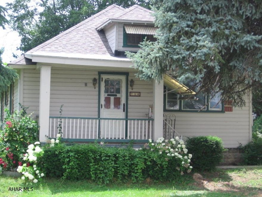 Close to everything with nice size yard carport and garage. Second level could make 3rd bedroom or den. This one needs some work but has great potential.