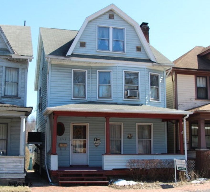 Newer roof, 3 Bedrooms plus heated finished attic for potential 4th bedroom, 2 car off street parking, pocket doors between livingroom and dining room.  Handy man special! This house is a must see!