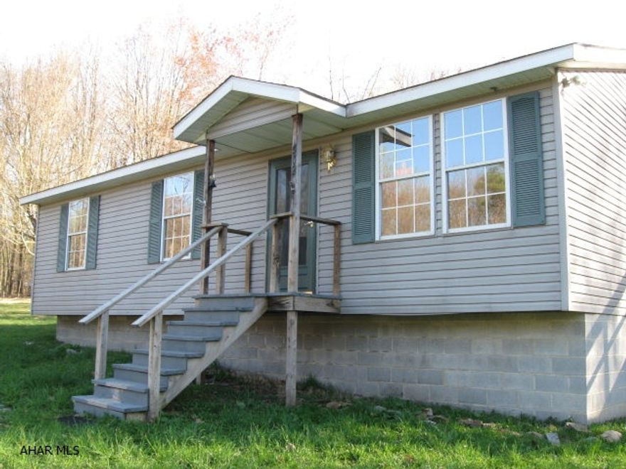 5.3 Acres great for horses.  Also great for hunting.  Stick built home in 1999 has new bath, paint, carpet, doors and more.  Near Reade Twp Sportsmans Club and State Game Lands.