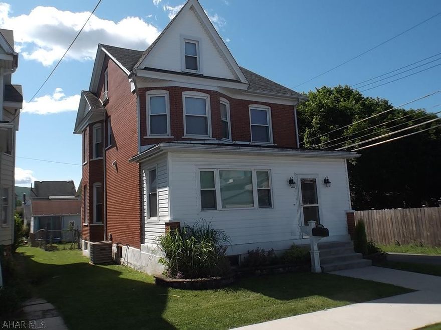 Very nice brick and vinyl sided Juniata home.  Spacious rooms, newly painted interior, remodeled kitchen. Replacement vinyl windows - one stained glass window on stairway landing.  Furnace and central A/C (3rd floor has elec. heat and a window A/C unit) new in 2009.  Roof replaced in 2006, porch roof in 2012.   Covered rear porch to enjoy summer cookouts.  Yard is fenced.  Garage is a single bay and has its own electric panel, a toilet and sink.  New concrete sidewalk and front steps.  New garage man door on order to be installed.